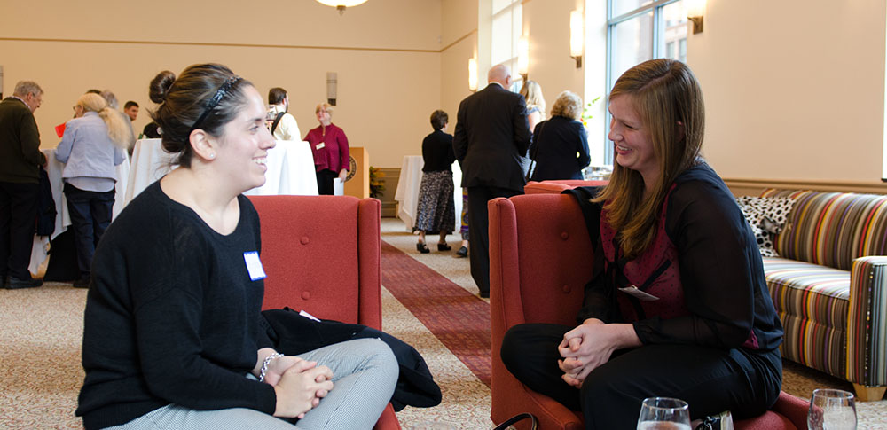 Pictured are graduate students at the welcome reception. Photo by 